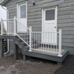 cabana beach house white railing porch deck side