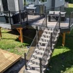 cabana earl grey fiberon composite deck with fortress rail tinted glass finished kanata