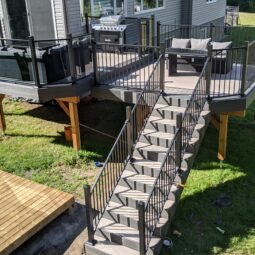 cabana earl grey fiberon composite deck with fortress rail tinted glass finished kanata