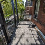 cottage earl grey composite deck with fortress railing