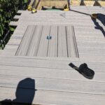 trex rocky harbour backyard deck cistern cover installation